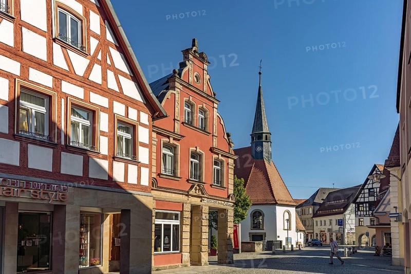 Half-timbered house and the Roman Catholic hospital church of St. Katharina in Forchheim, Upper Franconia, Bavaria, Germany