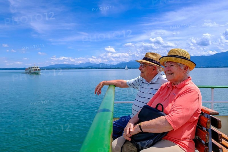 Seniors on a boat trip on the Chiemsee, Chiemgau, Upper Bavaria, Bavaria, Germany