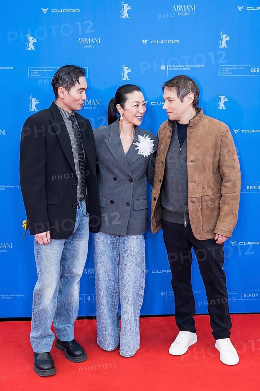 Hang Chong, Michelle Yeoh and Sean Baker in front of the premiere of the film Everything Everywhere All At Once at the Berlinale in Berlin's Zoo Palast on 13.02.2026. The 76th Berlin International Film Festival will take place from February 12 to 22, 2026