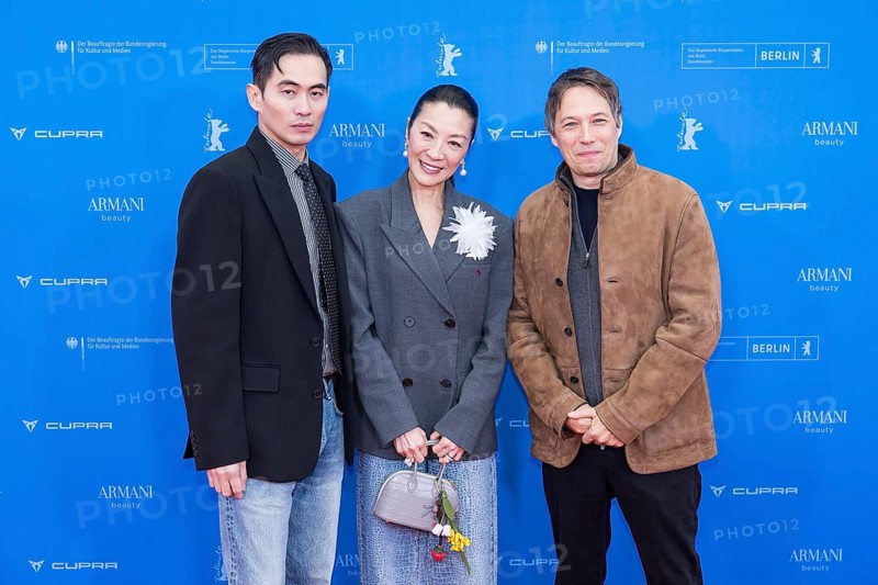 Hang Chong, Michelle Yeoh and Sean Baker in front of the premiere of the film Everything Everywhere All At Once at the Berlinale in Berlin's Zoo Palast on 13.02.2026. The 76th Berlin International Film Festival will take place from February 12 to 22, 2026
