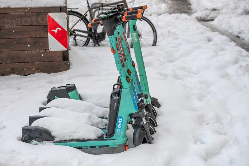 Parked, snow-covered scooters, Nuremberg, Middle Franconia, Bavaria, Germany