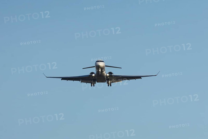 Gulfstream executive business jet aircraft in flight on approach to land at London Stansted airport, Essex, England, United Kingdom