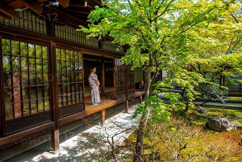 Japanese woman dressed in kimono in Kennin-ji Buddhist temple, O-shoin courtyard with Shione garden, Higashiyama, Kyoto, Japan