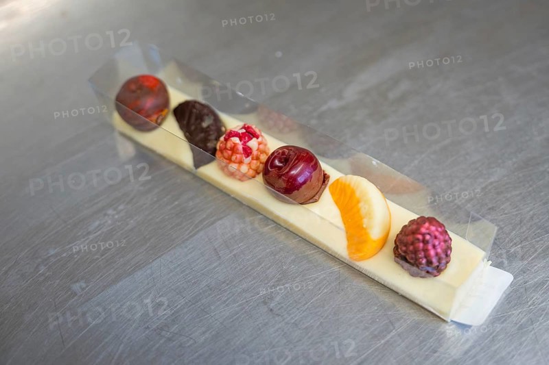 Elegant mix of chocolates in a decorative box with fruity accents, Easter production of regional products, Haselstaller Hof, Gechingen, Calw district, Germany