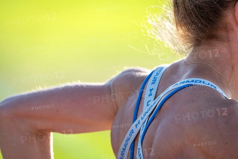 Close-up of a shoulder with sports straps in bright light, middle distance runner Katharina Jaiser, Gechingen, Germany