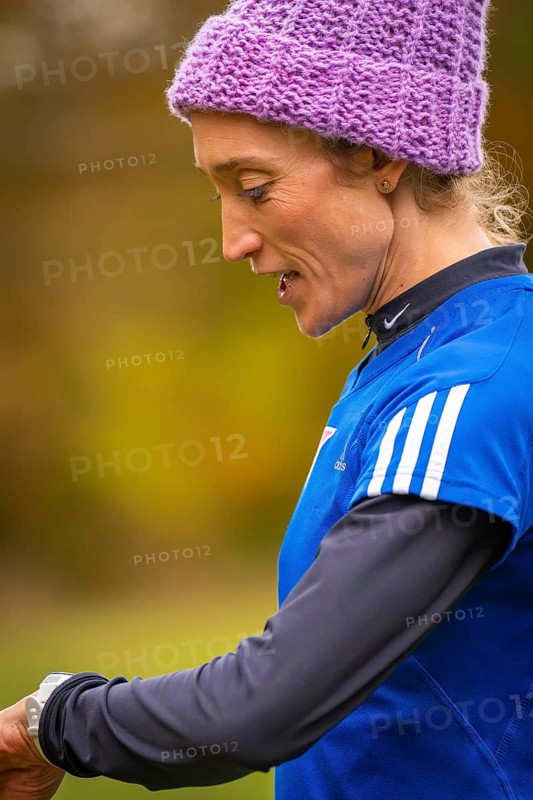 Close-up of a woman wearing sporty clothes, in an autumn setting, middle distance runner Katharina Jaiser, Gechingen, Germany