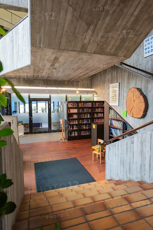 Modern staircase with library and wooden elements, Gechingen Town Hall, Calw district, Germany