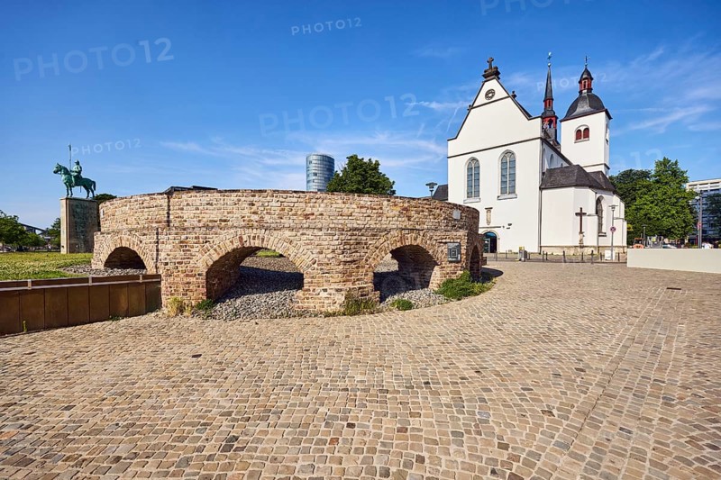 Historic railway hub, Alt St. Heribert church, equestrian statue, cobblestone walkway, lawn, trees, blue sky, cirrus clouds, Urbanstraße, Kennedy-Ufer, Cologne, district-free city, North Rhine-Westphalia, Germany