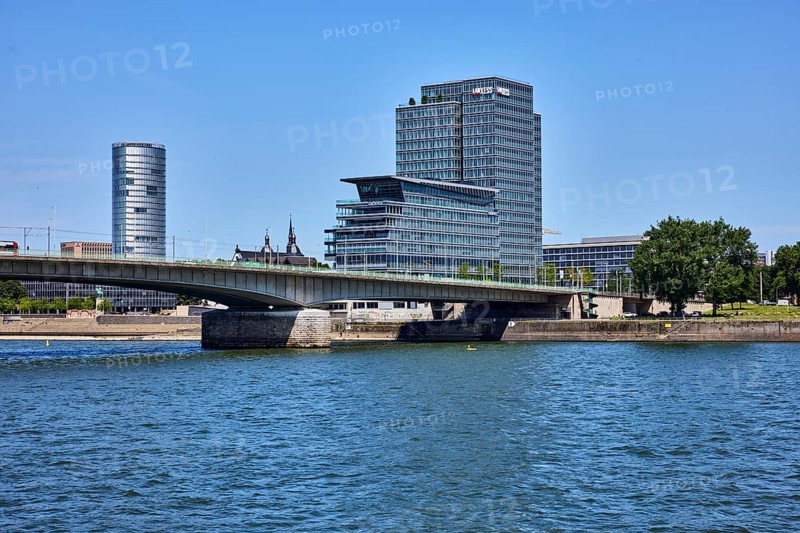 Rhine river, KölnTriangle and MaxCologne skyscrapers, Lanxess, corporate headquarters, general architecture, car, pedestrian, bicycle and tram bridge, Deutz bridge, waterfront, trees, blue sky, cloudless, Deutz shipyard, Cologne, district-free city, North Rhine-Westphalia, Germany