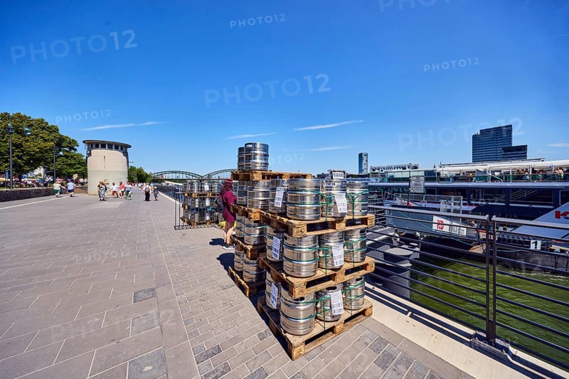 Pallets with beer barrels, boat launch, gangway, Rhine river, waterfront, level, metal railings, general architecture, pedestrians as a secondary motif, blue sky, cirrus clouds, Leystapelwerft, Cologne, district-free city, North Rhine-Westphalia, Germany