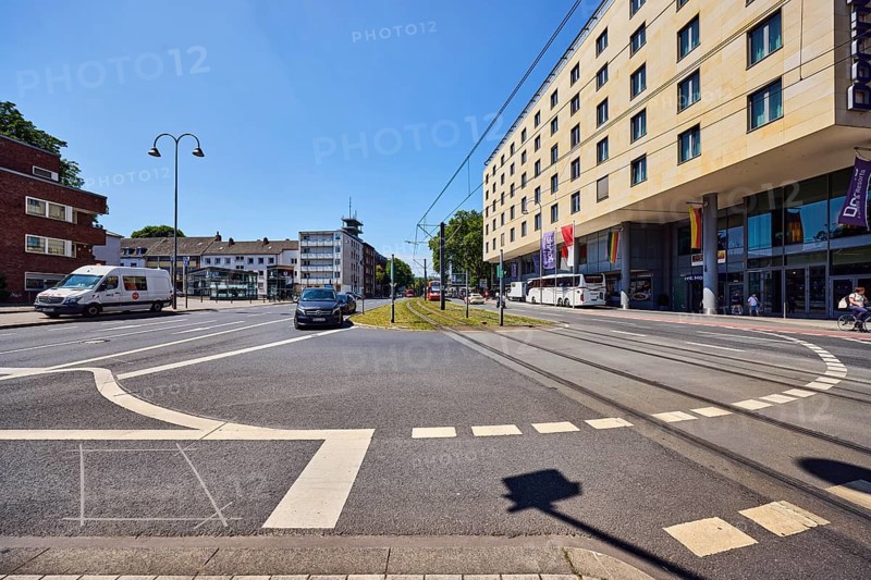Dorint hotels, general development, commercial buildings, modern architecture, overhead lines, tram tracks, street, cycle path, turning facility, car, pickup truck, coach, road markings lanes, blue sky, cloudless, intersection Kleine Sandkaul, Augustinerstraße and Pipinstraße, Cologne, district-free city, North Rhine-Westphalia, Germany