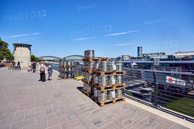 Pallets with beer barrels, boat launch, gangway, Rhine river, waterfront, level, metal railings, general architecture, pedestrians as a secondary motif, blue sky, cirrus clouds, Leystapelwerft, Cologne, district-free city, North Rhine-Westphalia, Germany