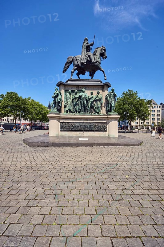 Frederick William III of Prussia monument, equestrian statue, general architecture, buildings, trees, pedestrians as accessories, blue sky, cirrus clouds, Heumarkt square, Cologne, district-free city, North Rhine-Westphalia, Germany