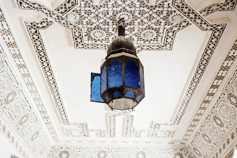 Lamp and stucco ceiling, Souk, Marrakech, Morocco