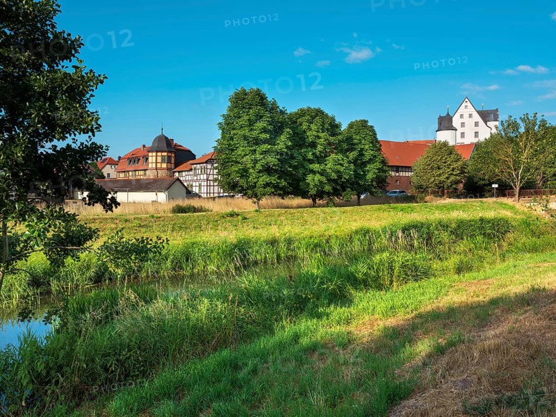 View across the Helme River to Heringen Castle, Thuringia, Germany