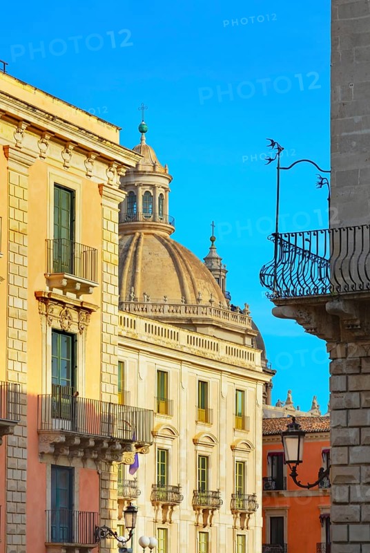 Historic centre view including the dome of Badia di Sant'Agata church, Catania, Sicily, Italy
