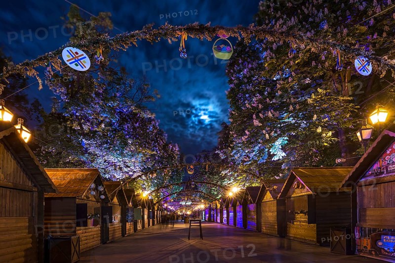 Souvenir stalls lit at night on Svobody Prospekt, Lviv, Ukraine