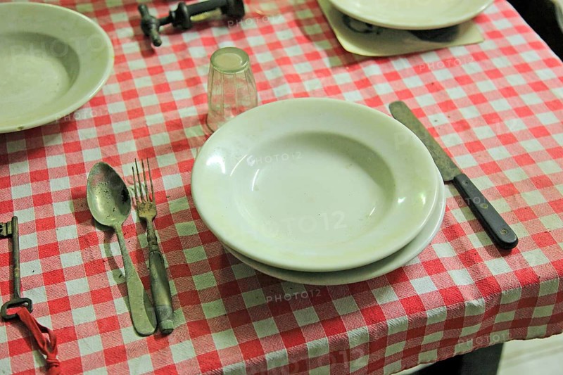 Museo della Civiltà Contadina, Farmers' Museum, dining table with crockery and cutlery, La Rocca, Novellara Castle, Emilia-Romagna, Italy