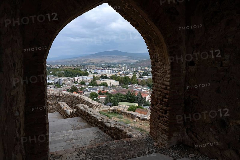 Gori, Georgia. September 9th 2025. View of Gori city from the entrance of Gori Fortress, a medieval citadel in Georgia, situated above the city of Gori on a rocky hill