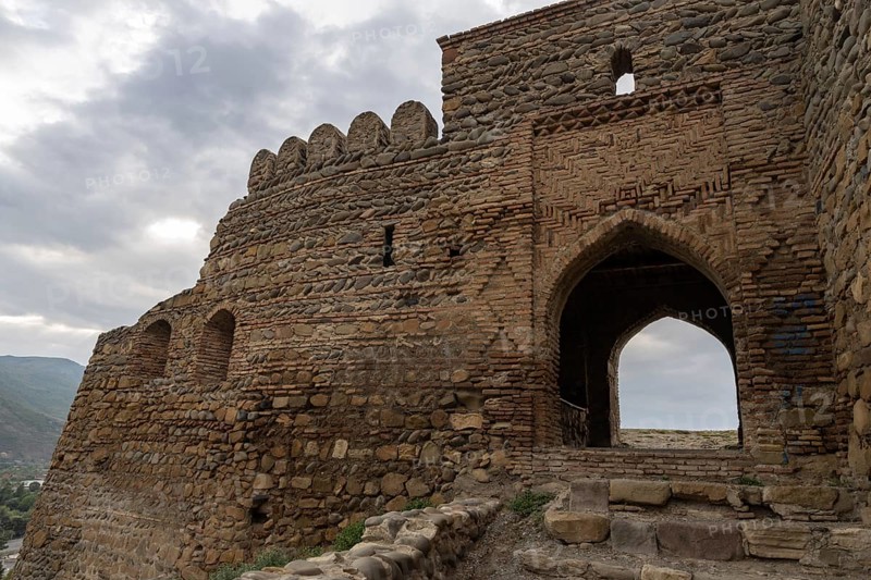 Gori, Georgia. September 9th 2025. The battlements and entrance to Gori Fortress, a medieval citadel in Georgia, situated above the city of Gori on a rocky hill