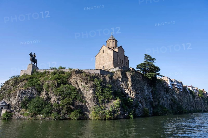 Tbilisi, Georgia. July 13th 2025. Metekhi Church of the Nativity and the Virgin Mary overlooking the Mtkvari River, an iconic landmark in the center of the Georgian capital, Tbilisi, Georgia