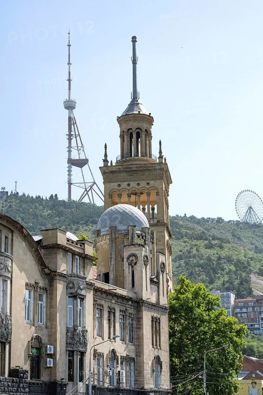 Tbilisi, Georgia. July 11th 2025. View from Tbilisi's Rose Revolution square of the Georgian National Academy of Sciences and Tbilisi's TV Tower sitting atop Mtatsminda hill, Tbilisi, Georgia
