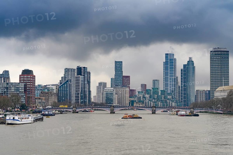 London, United Kingdom. January 31st, 2025. Heavy clouds over a panorama view of the city of London with offices and tall buildings, offices and hotels, seen from Westminster Bridge over the River Thames. London, UK