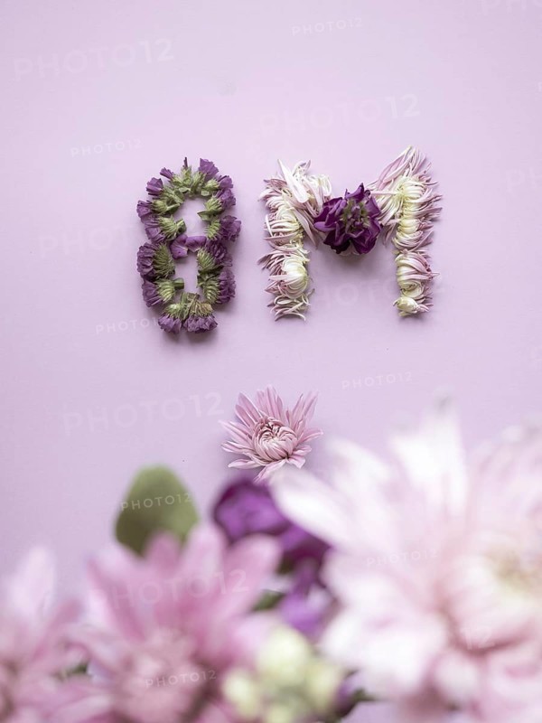 Floral composition creating the numbers 8m against a pastel background, celebrating international women's day