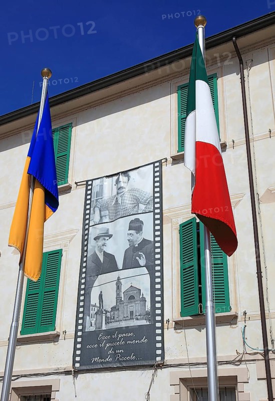 Italy, Brescello village, the town hall, Don Camillo and Peppone, flags, Italian