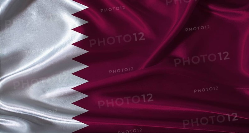 National flag of Qatar with cloth texture. Qatar flag with realistic texture background