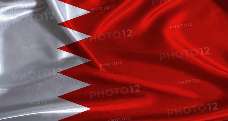 Bahrain flag with cloth textured background. National flag of Bahrain with realistic texture