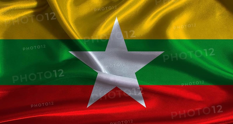 Myanmar flag with cloth textured background. National flag of Myanmar with realistic texture