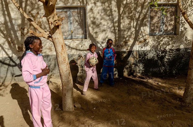 Aswan, Egypt. December 20th 2012 Young Nubian children play football in Nuba Nasr, a modern village housing displaced Nubians after the building of Aswan High dam. Egypt
