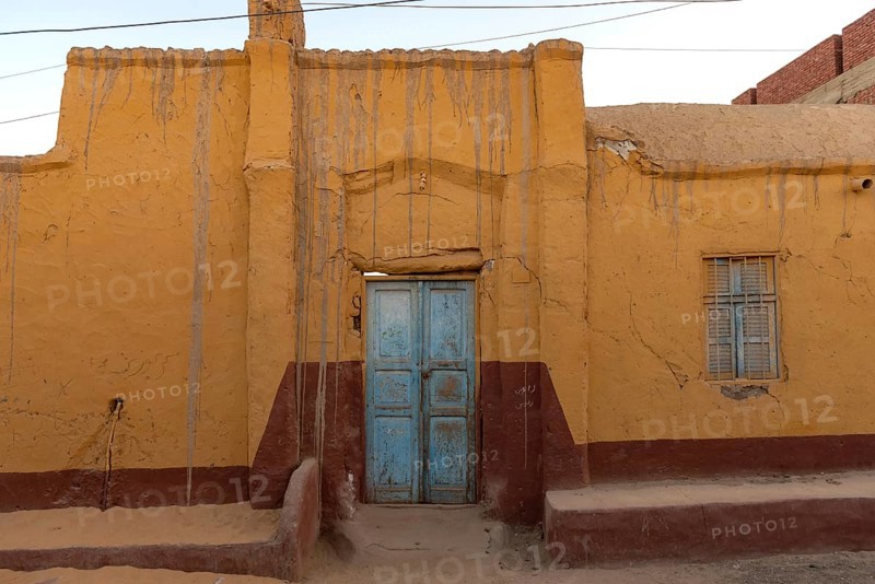 Aswan, Egypt. December 10th 2022 Traditional brightly coloured painted Nubian house in a village on the west bank of the River Nile near Aswan in Upper Egypt
