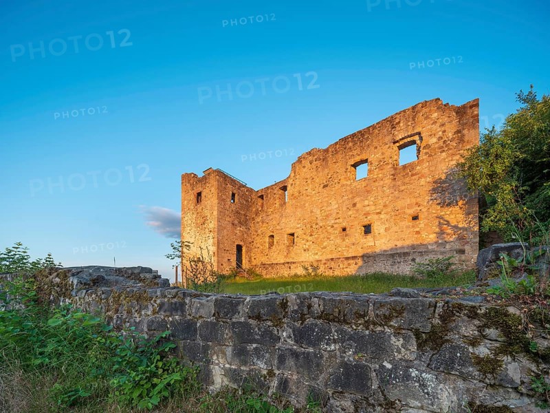 The ruins of Bramberg Castle in the Hassberg Mountains in the evening light, near Königsberg in Bavaria, Lower Franconia, Bavaria, Germany