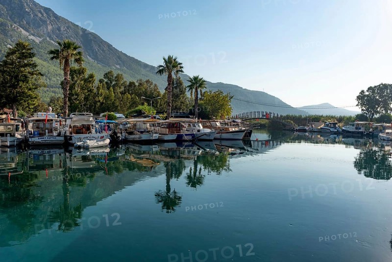 Akyaka, Mugla, Turkey. September 8th 2022 Boats moored in the beautiful harbour at the entrance to the Azmak River, at the Turkish Riviera seaside town of Akyaka on the south west coast of Turkey