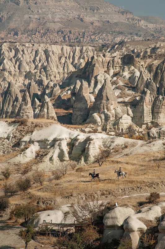 Cappadocia, Turkey. November 8th 2017 Horse riders in the Gorkundere Valley near the Anatolian town of Goreme in Cappadoca, Turkey. The dramatic volcanic landscape of central Anatolia in Turkey is known as the Land of Beautiful Horses