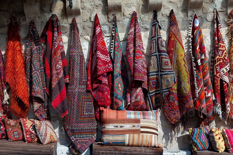 Beautiful traditional Anatolian rugs and carpets for sale outside a Turkish shop in Cappadocia, central Turkey