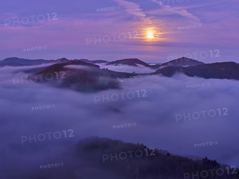 View from the Gisliflue of the Jurassic foothills covered in fog from the left, Wasserfluh, Summerholde, Asperstrihen, Strihen, in the light of a full moon, Talheim, Canton, Aargau, Switzerland