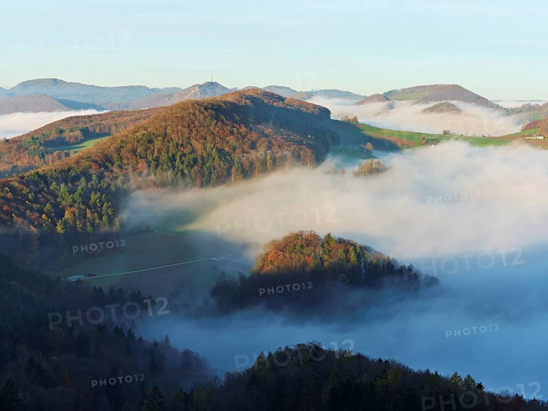 View from the Gisliflue of the Jura foothills covered in fog from the left, Wasserfluh, Summerholde, Asperstrihen, in the morning light, Talheim, Canton, Aargau, Switzerland