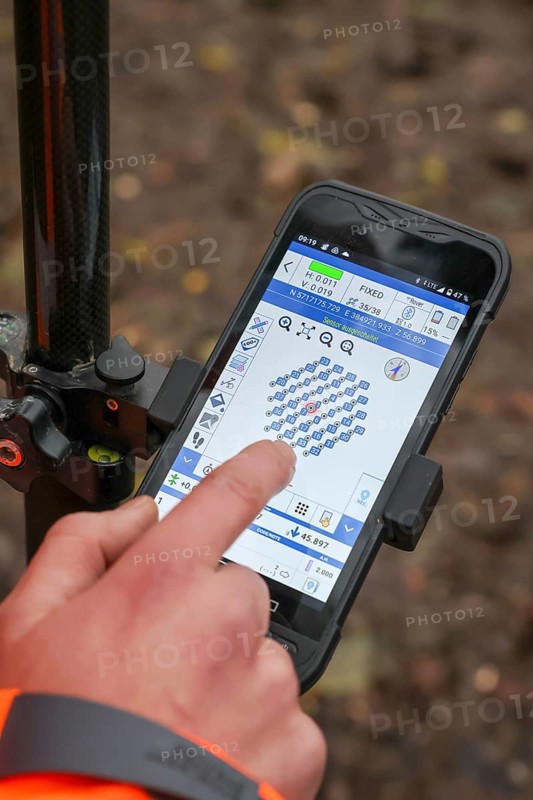Castrop-Rauxel, North Rhine-Westphalia, Germany - Theme photo - Explosive soundings - Deep soundings are used to check dud suspicion points. 11-meter deep boreholes are secured with plastic pipes and borehole measurements of ferromagnetic suspicions are carried out with a probe. Measurement points are controlled via an app on the mobile phone
