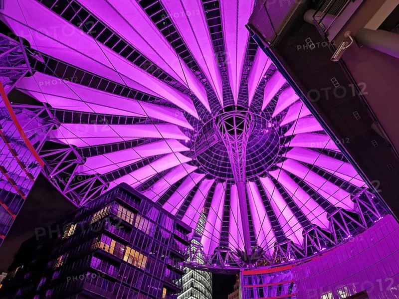 Illuminated roof of the Center am Potsdamer Platz in Berlin in bright pink, with futuristic design, Berlin