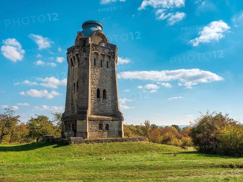 The Bismarck Tower at Großer Fallstein in autumn under a blue sky with fair weather clouds, Harzvorland, Osterwieck, Saxony-Anhalt, Germany