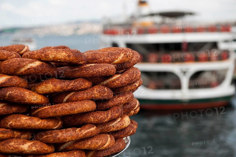 Typical Turkish Street Food, Simit for sale on the Galata Bridge in Istanbul, Turkey