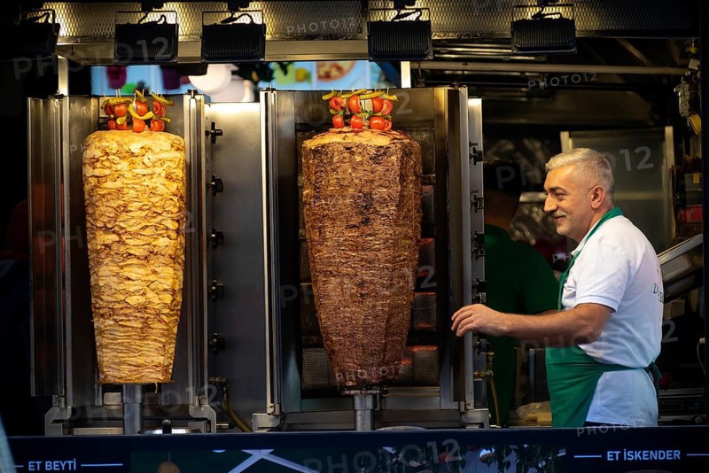 Istanbul, Turkey 10th November 2022 Turkish Kebab meat cooking on large skewers in a take away sandwich shop in Istiklal Street, Istanbul, Tukey