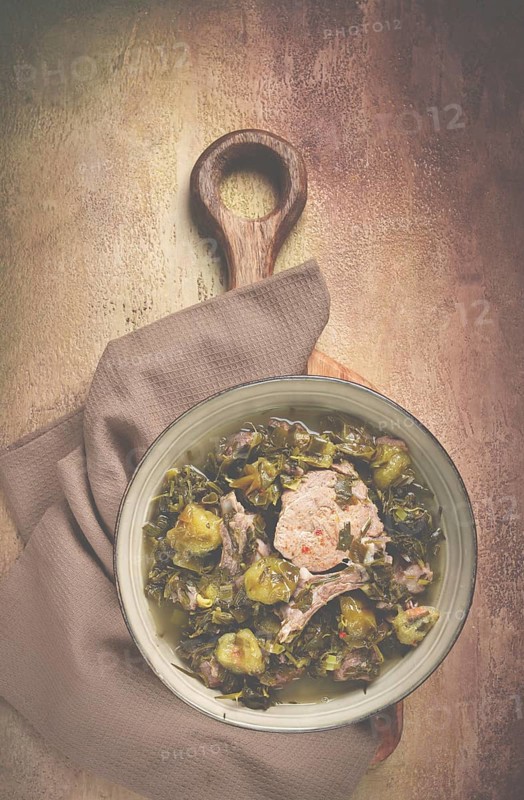 Chakapuli, Georgian dish, stewed meat with herbs and tkemali, in white wine, homemade, no people