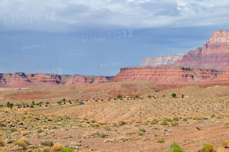 Wide desert landscape with red rocks and partly cloudy sky, Grand Canyon National Park, Arizona, USA