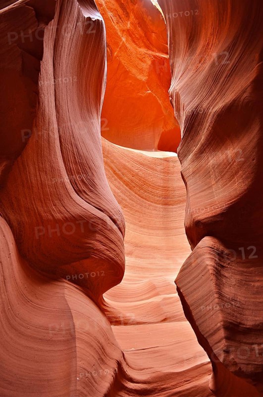 Strong shadows in a dramatic sandstone gorge in shades of orange with bright colors, Antelope Canyon, Navajo Nation Reservation, Lake Powell Tribal Park, Arizona, USA