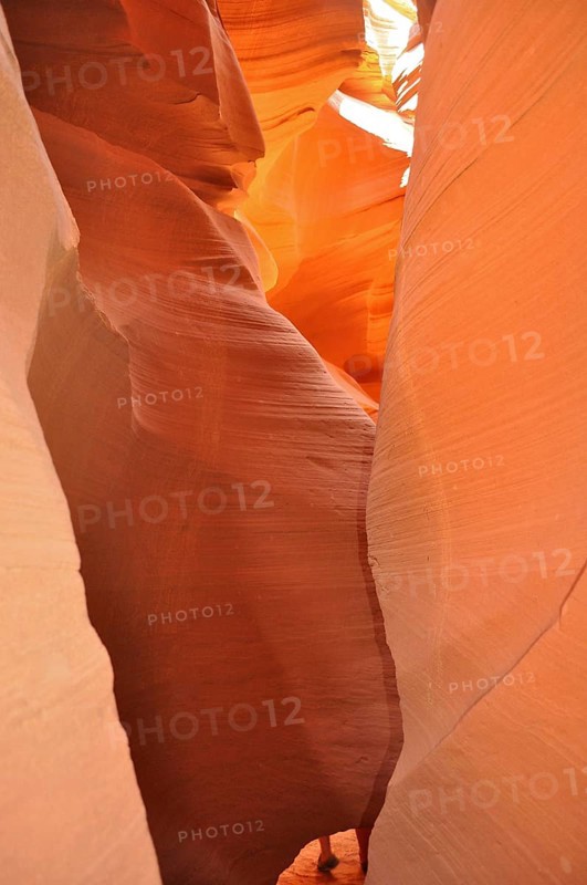 Narrow passage of smooth orange sandstone forming a natural rock formation, Antelope Canyon, Navajo Nation Reservation, Lake Powell Tribal Park, Arizona, USA
