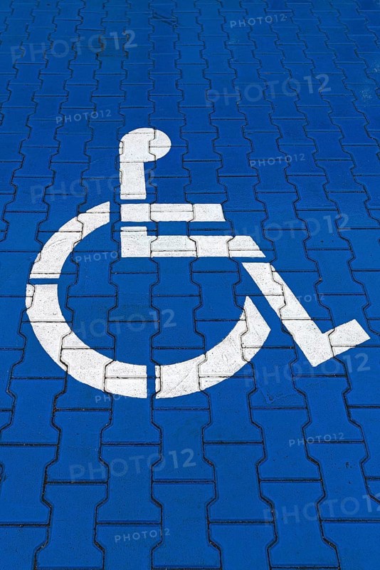 Parking space marked in blue for disabled people, Krakow, Poland